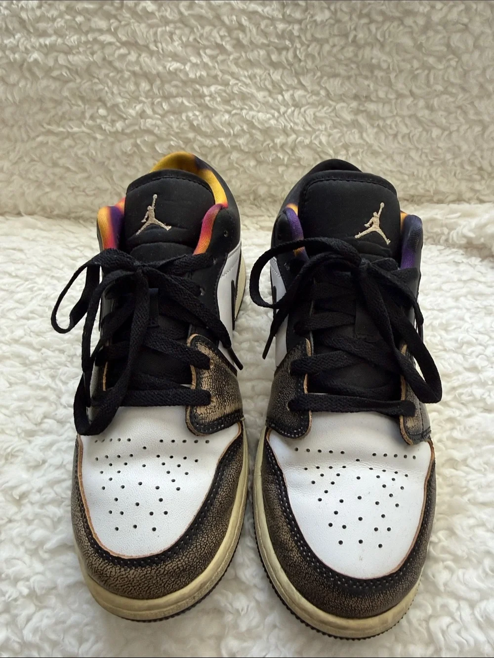 Nike Air Jordan’s Low-Top Sneakers in White, Black and Bronze. Size 7Y.